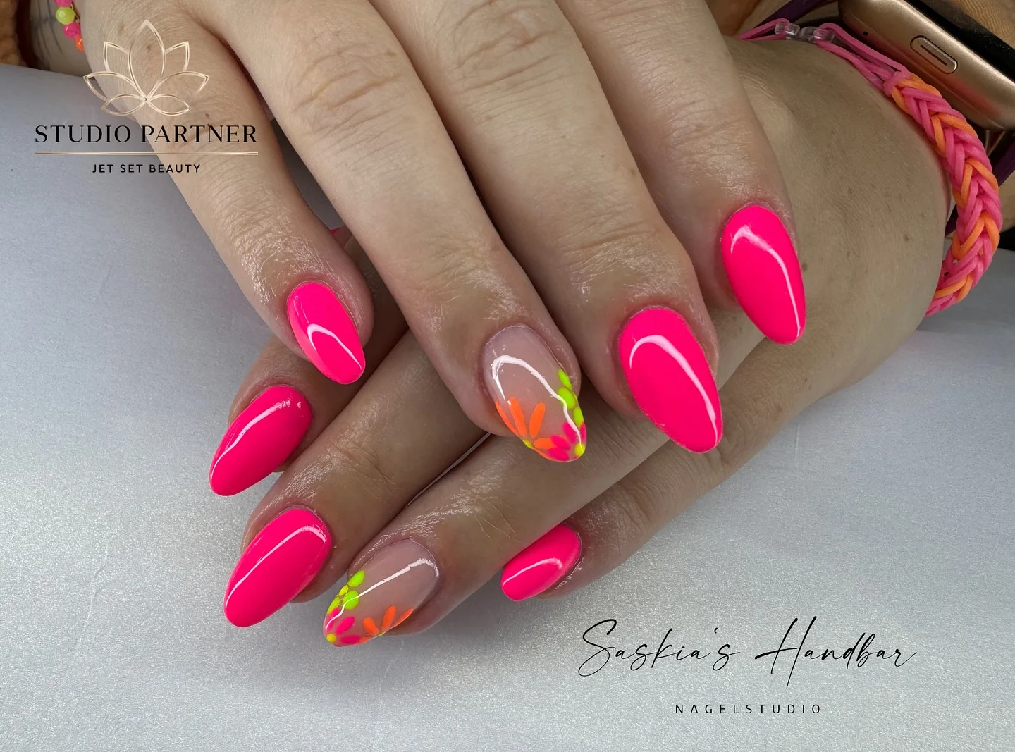 neon summer nails 2026 Hot Pink Floral Nails That Glow In Summer Sunlight