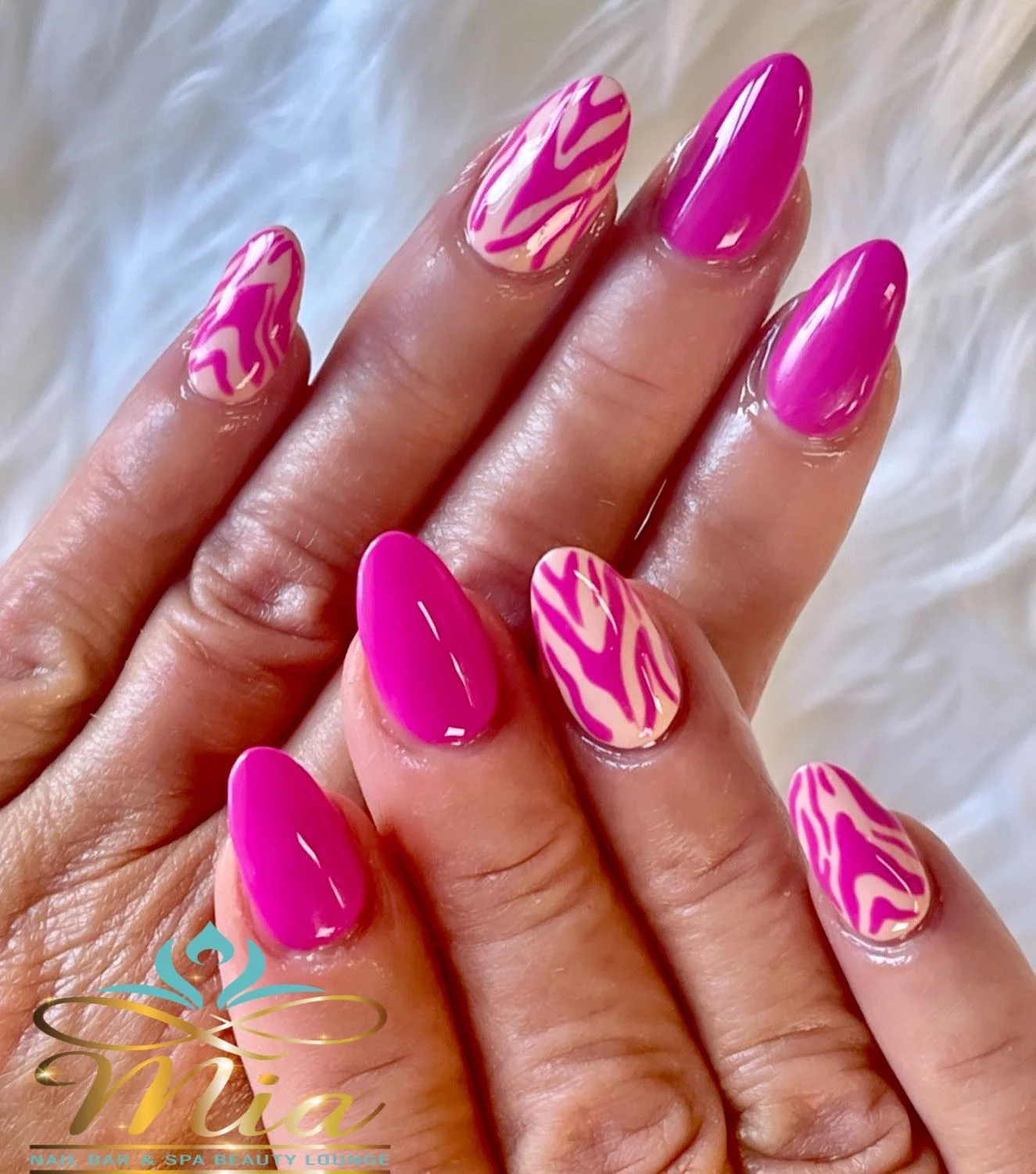 pink summer nails 2026 Hot Pink Zebra Swirl Almond Nails