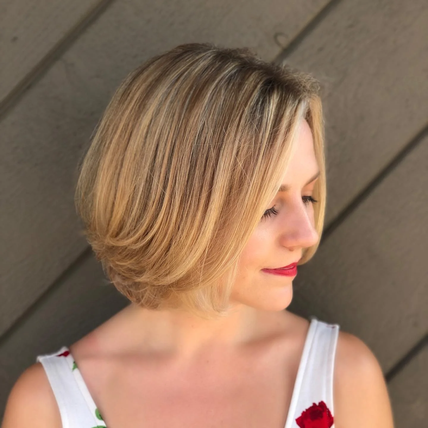 sleek summer short haircuts 2026 Soft Layered Blonde Bob With Natural Volume