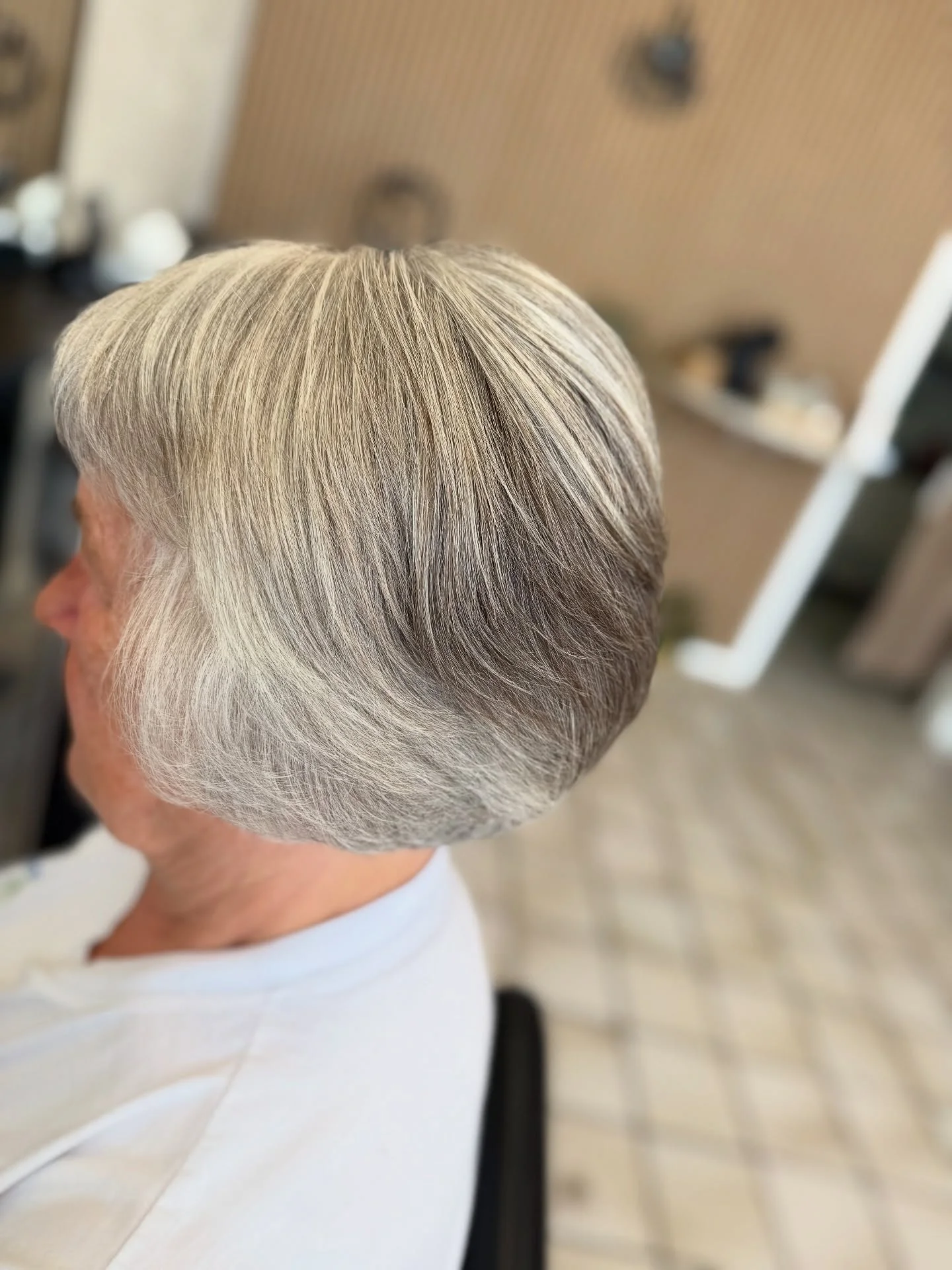 stylish summer haircuts for women over 60 2026 Rounded Silver Bob With Seamless Volume
