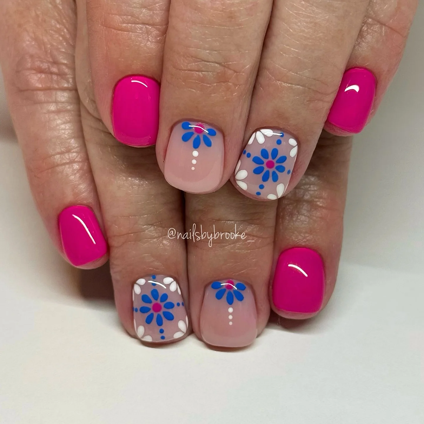pink summer nails 2026 Short Pink Daisy Nails With Blue Floral Art