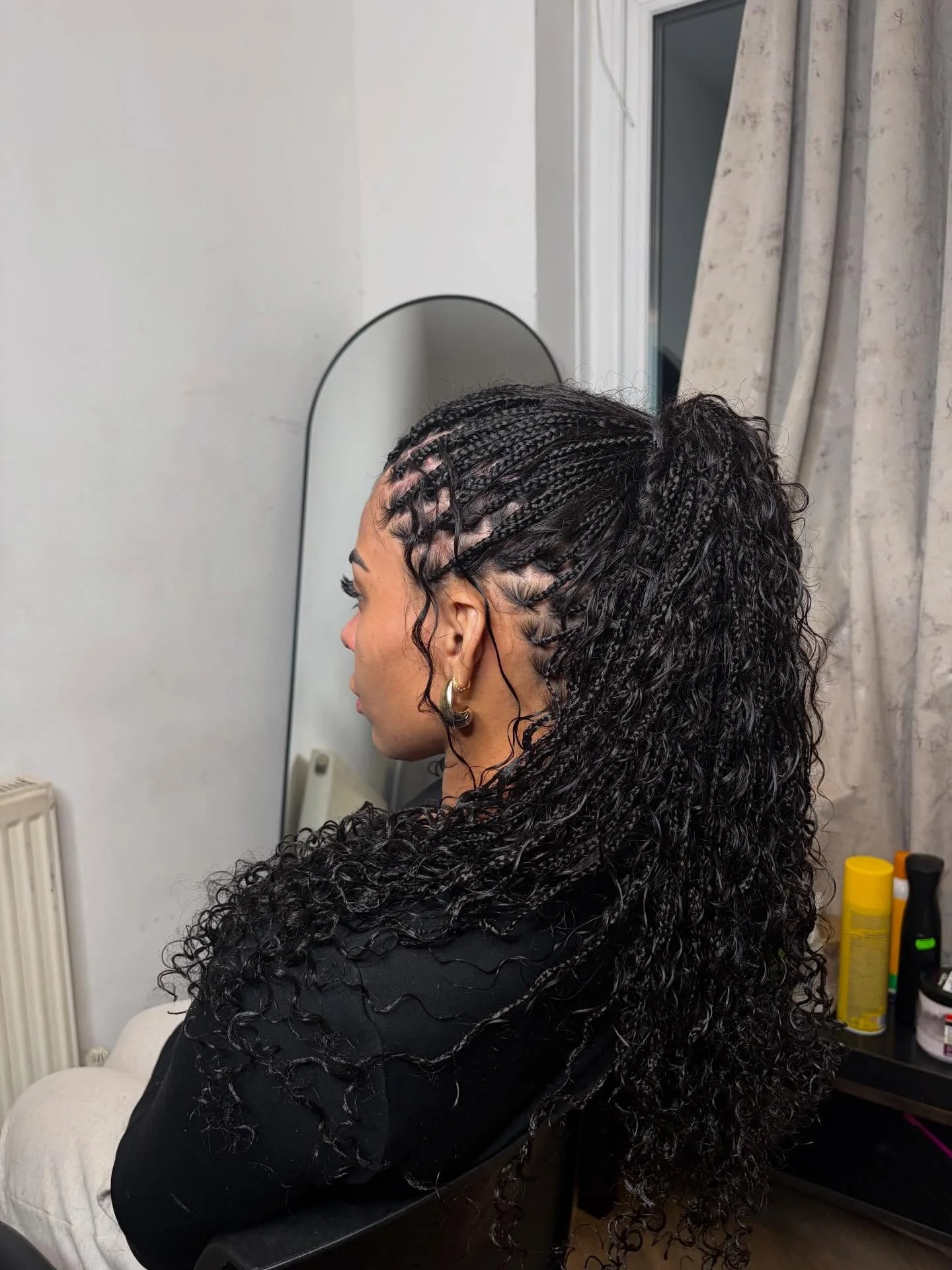 regal summer hairstyle black women 2026 High Curly Ponytail With Intricate Feed-In Braids