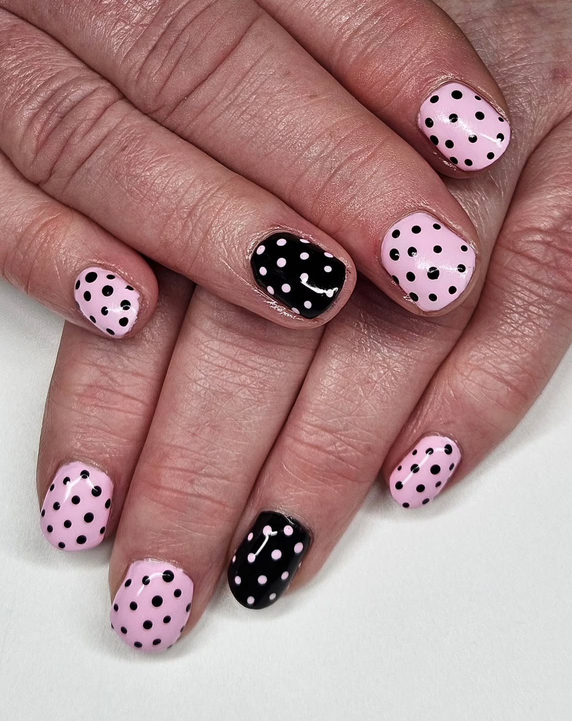 short gel nails summer 2026 Soft Pink Polka Dot Nails With A Vintage Twist