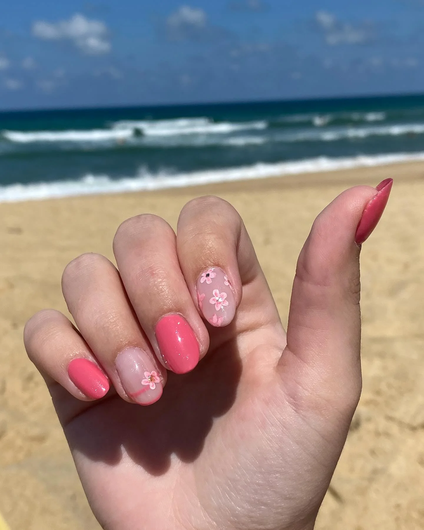 summer beach nails 2026 Glossy Pink Floral Nails For Soft Summer Days