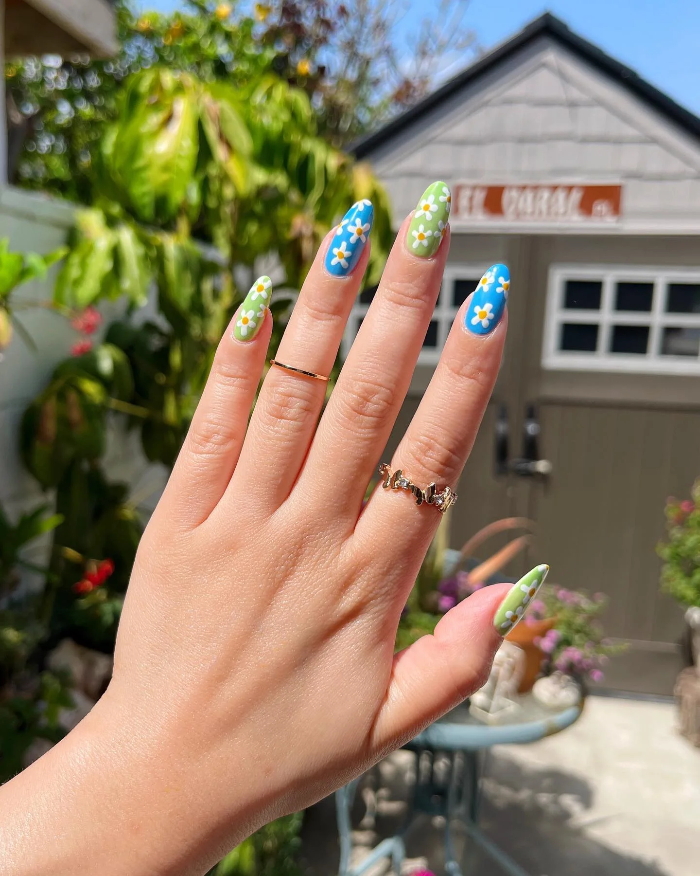 summer flower nails 2026 Playful Daisy Nails In Blue And Green Summer Shades