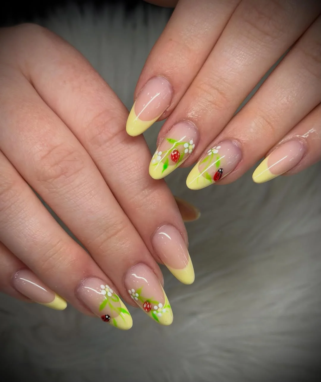 summer french tip nails 2026 Butter Yellow French Tips With Tiny Daisy Garden Details