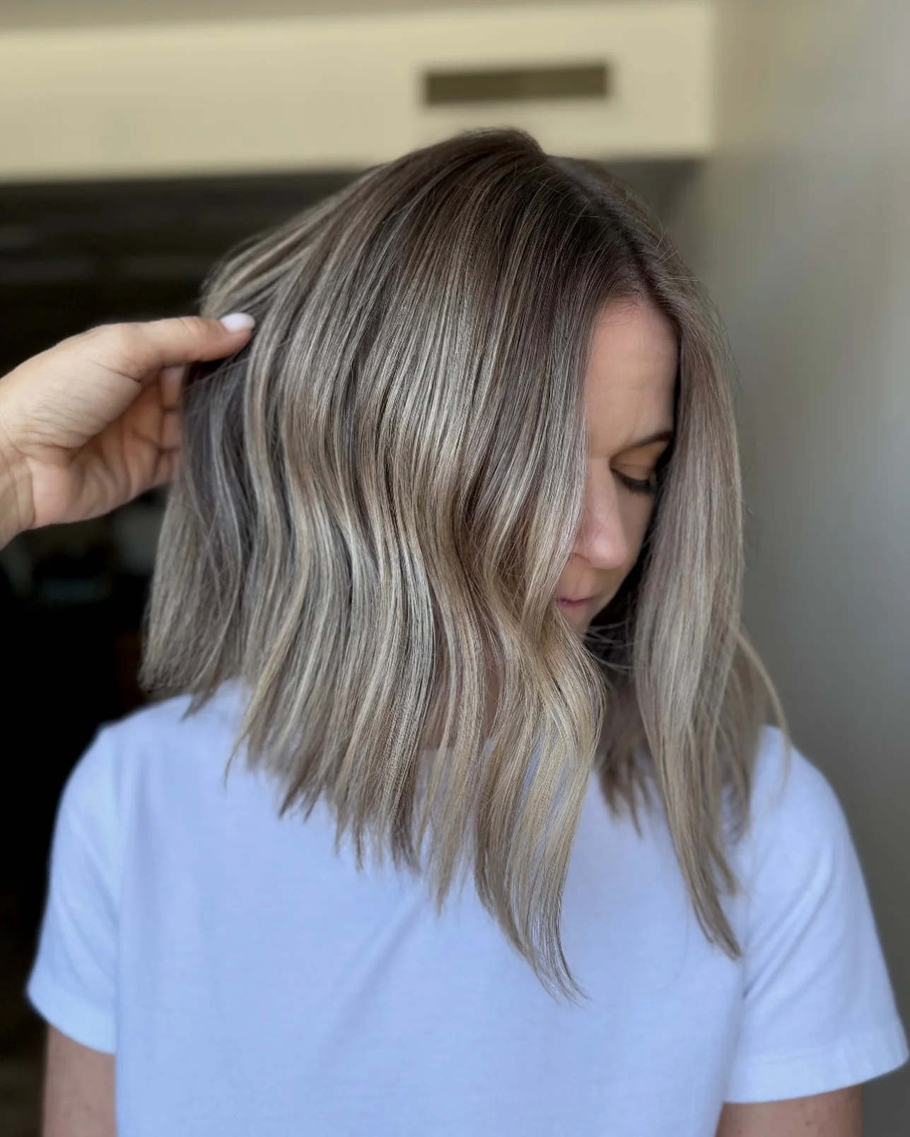 light summer haircuts for medium hair 2026 Textured Ash Blonde Lob With Soft Breaks