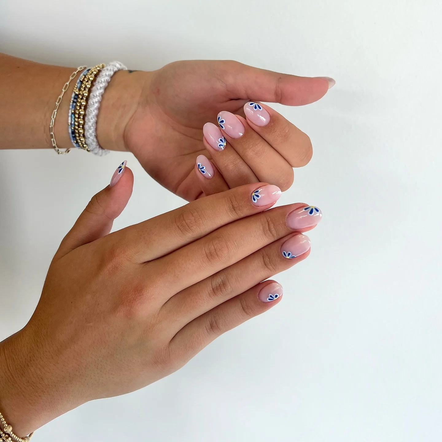 light summer nails 2026 Minimal Blue Petal Nails On A Milky Pink Base