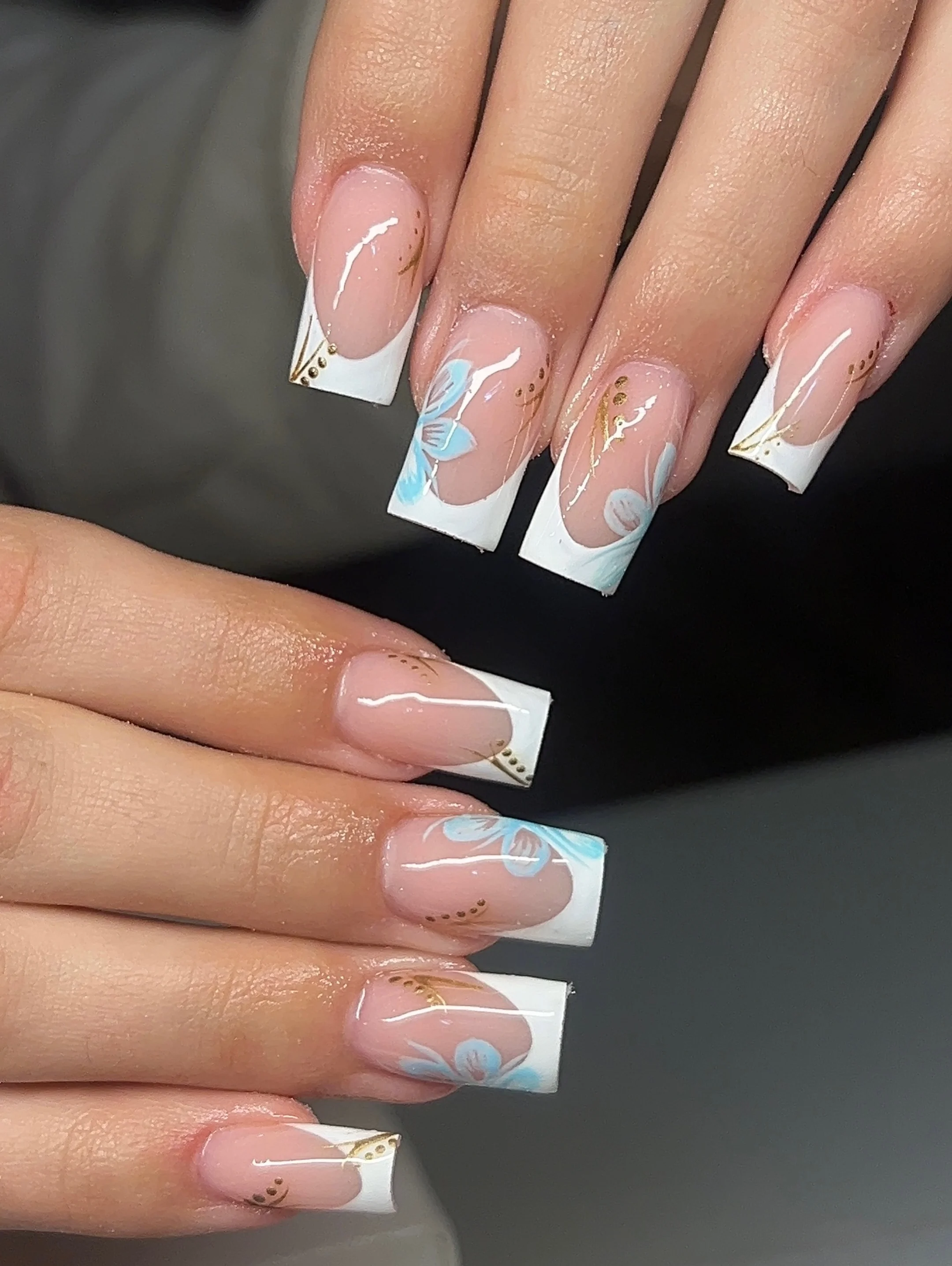 summer acrylic nails 2026 Classic White French Acrylics With Powder Blue Floral Accents