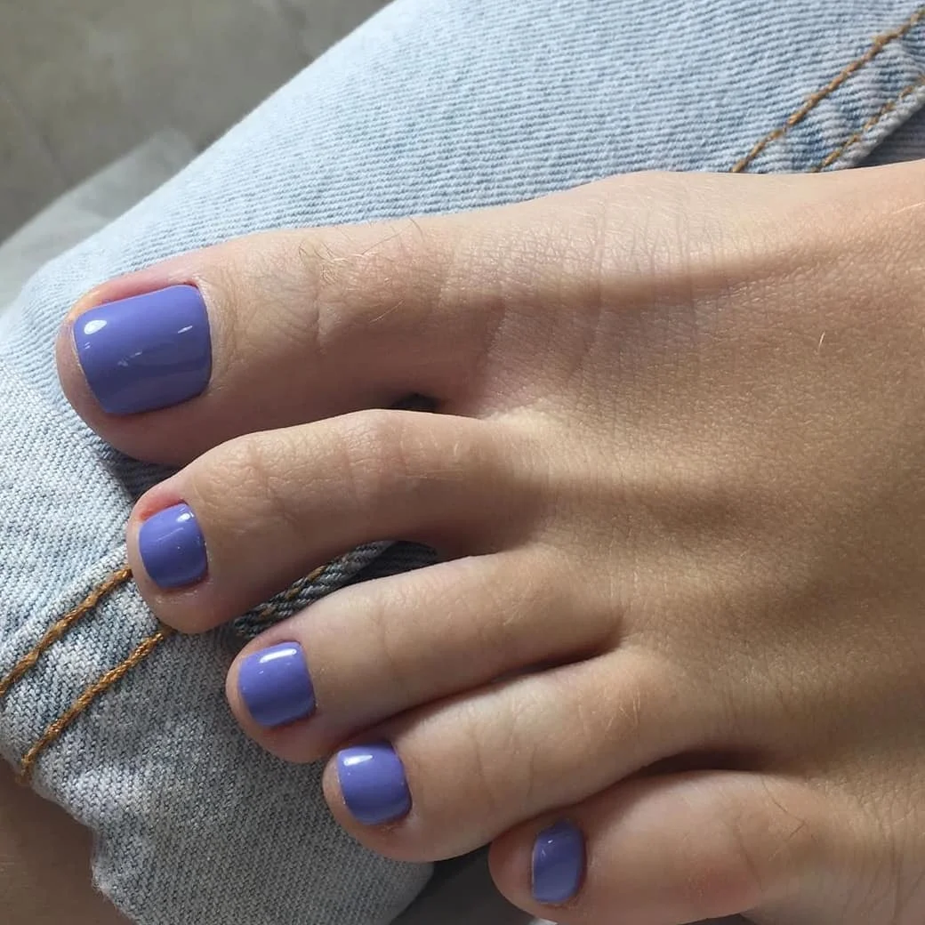 summer toe nails colors 2026 Lavender Gloss Pedicure For A Soft Feminine Finish