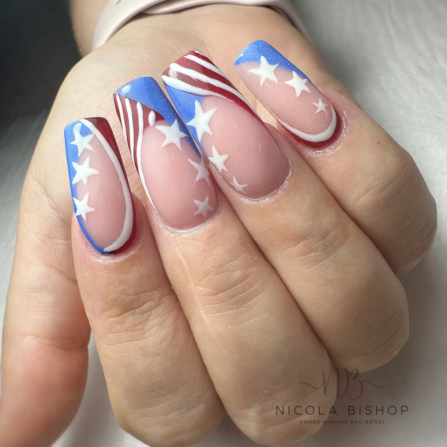 usa nails 2026 Milky Nude French Tips With Airbrushed Americana Stars