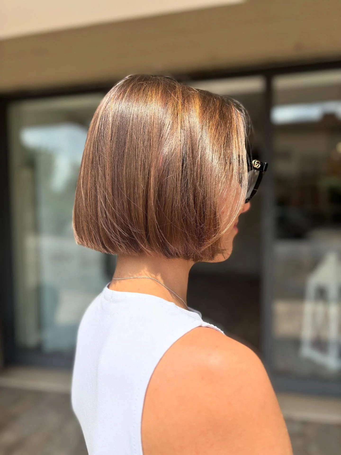 perfect summer haircut 2026 Glossy Sculpted Bob With Precision Ends