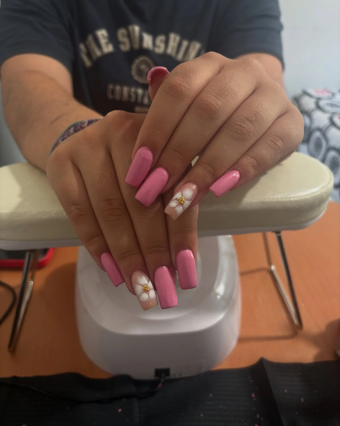 pink summer nails 2026 Glossy Bubblegum Pink Square Nails With Daisy Details
