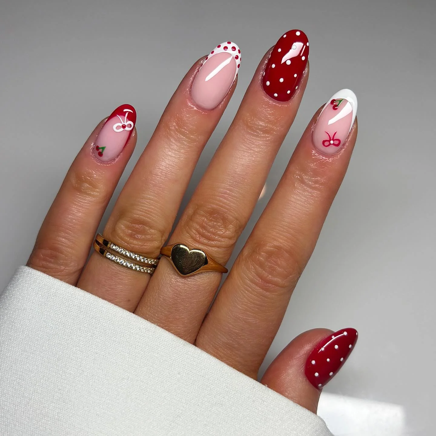 polka dot summer nails 2026 Cherry Red French Tips With Retro Dot Details