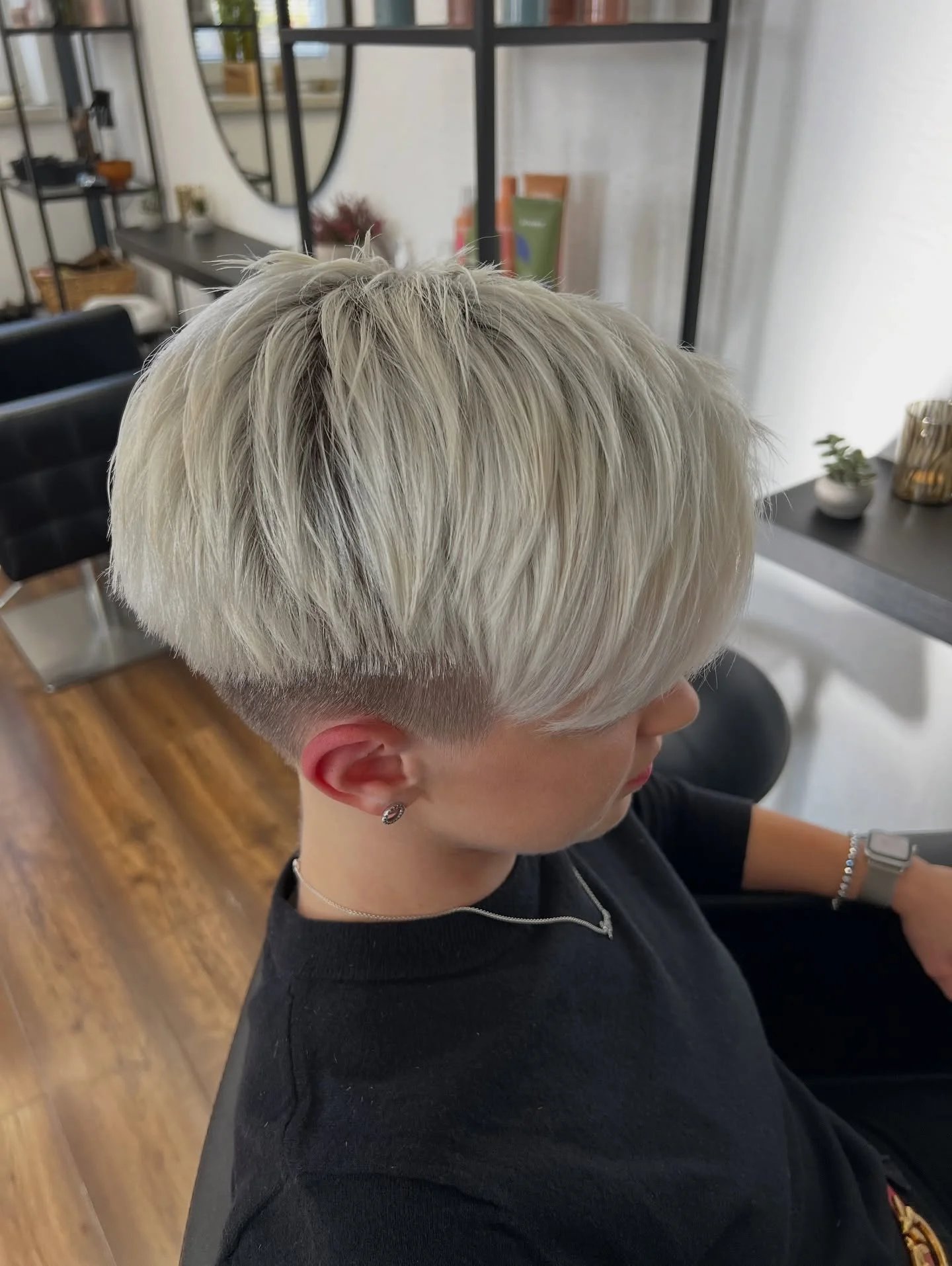summer short haircuts 2026 Rounded Blonde Bowl Cut With Undercut Edge
