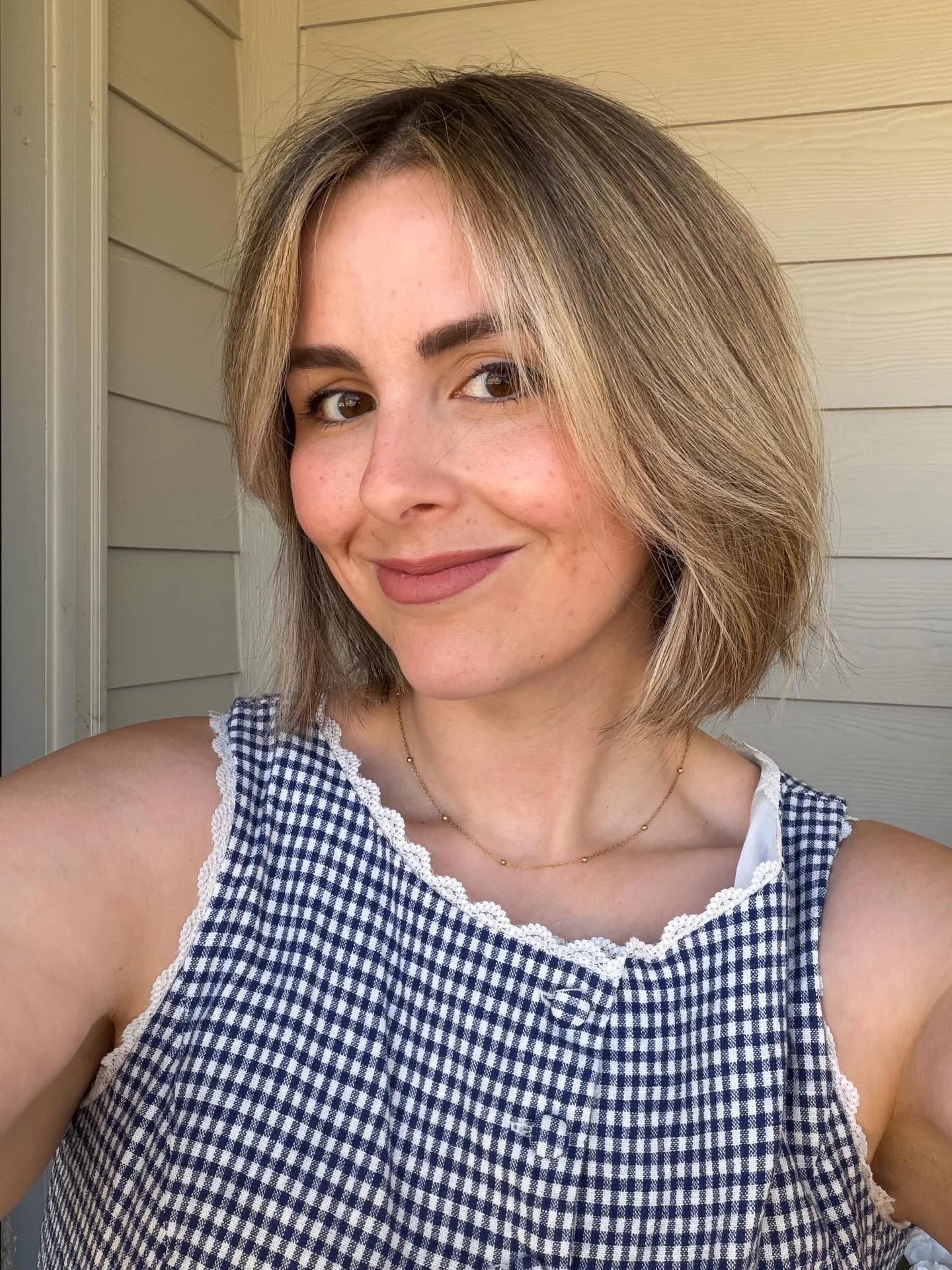 sophisticated summer haircuts for women over 40 2026 Blunt Soft Blonde Bob With Center Part