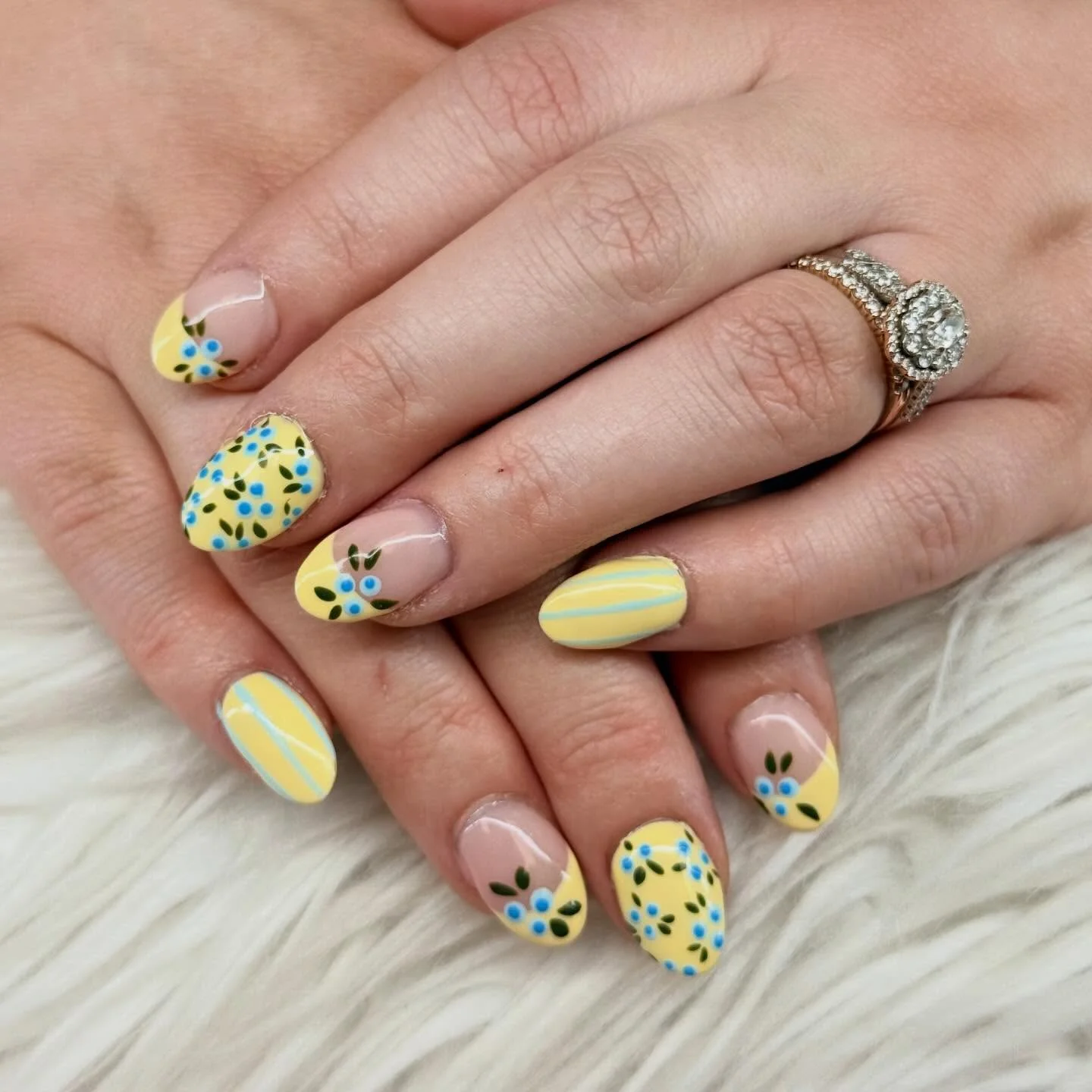 summer yellow nails 2026 Blue And Yellow Floral Nails With Playful Retro Energy