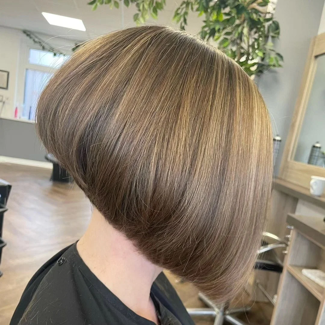angled summer bob haircut 2026 Polished Brunette Angle With Clean Tapered Edge