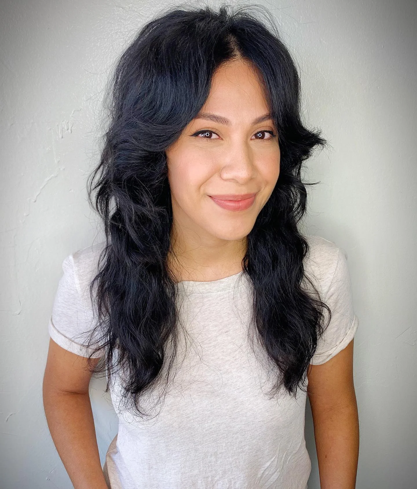 edgy summer shag hairstyle 2026 Soft Jet Black Butterfly Shag