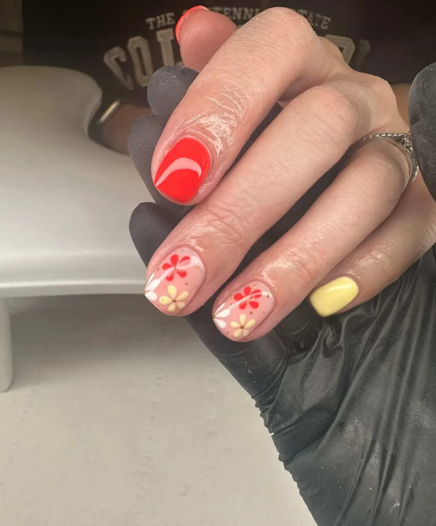 short summer nails 2026 Retro Floral Nails With Soft Citrus Tones