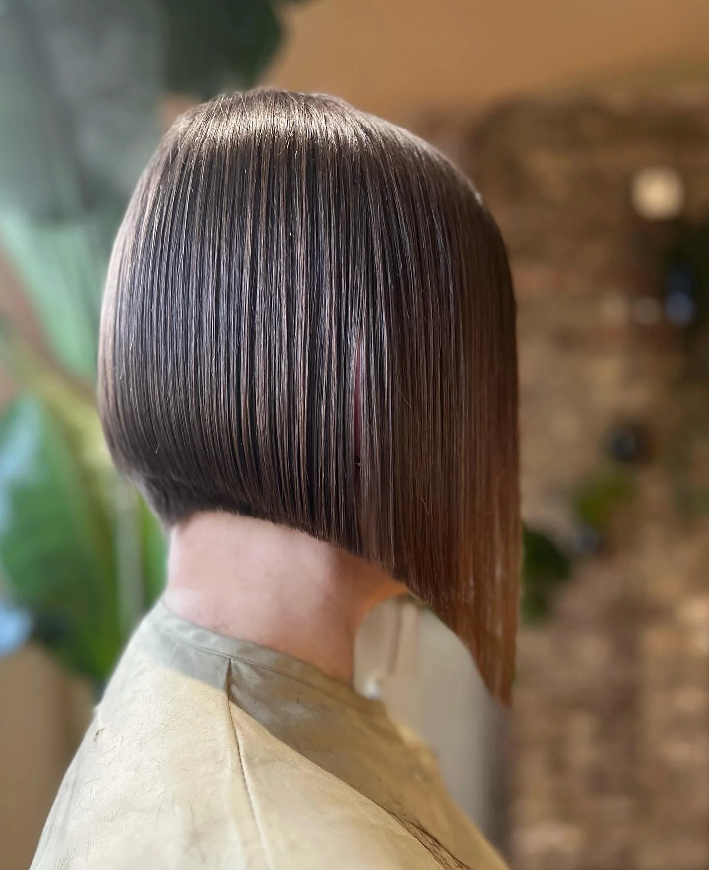 sleek summer short haircuts 2026 Precision Glass Bob With Sharp Angle