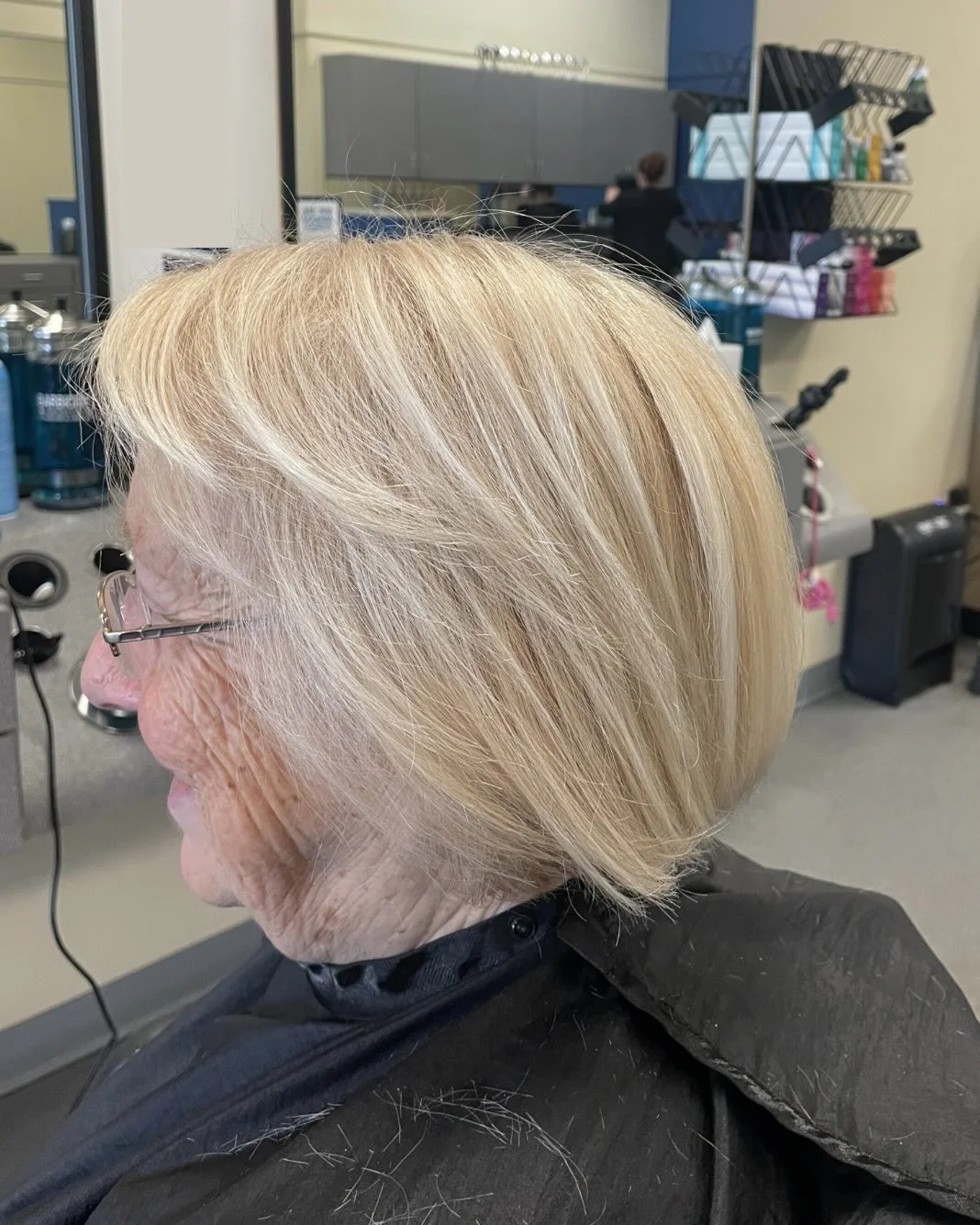 stylish summer haircuts for women over 60 2026 Classic Side Swept Bob With Glasses Friendly Shape