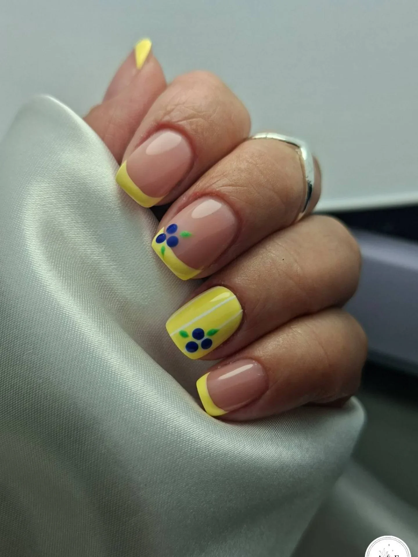 summer french tip nails 2026 Sunny Lemon French Tips With Tiny Blue Berry Accents