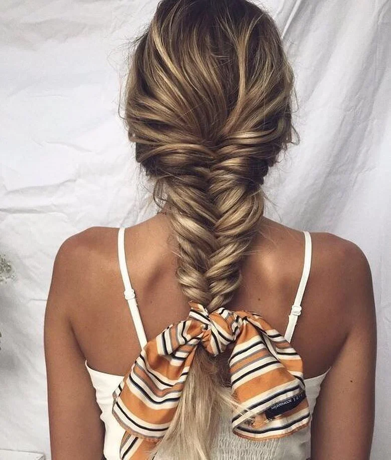 flattering summer quick hairstyles 2026 Oversized Fishtail Braids Feel Made For Coastal Summers
