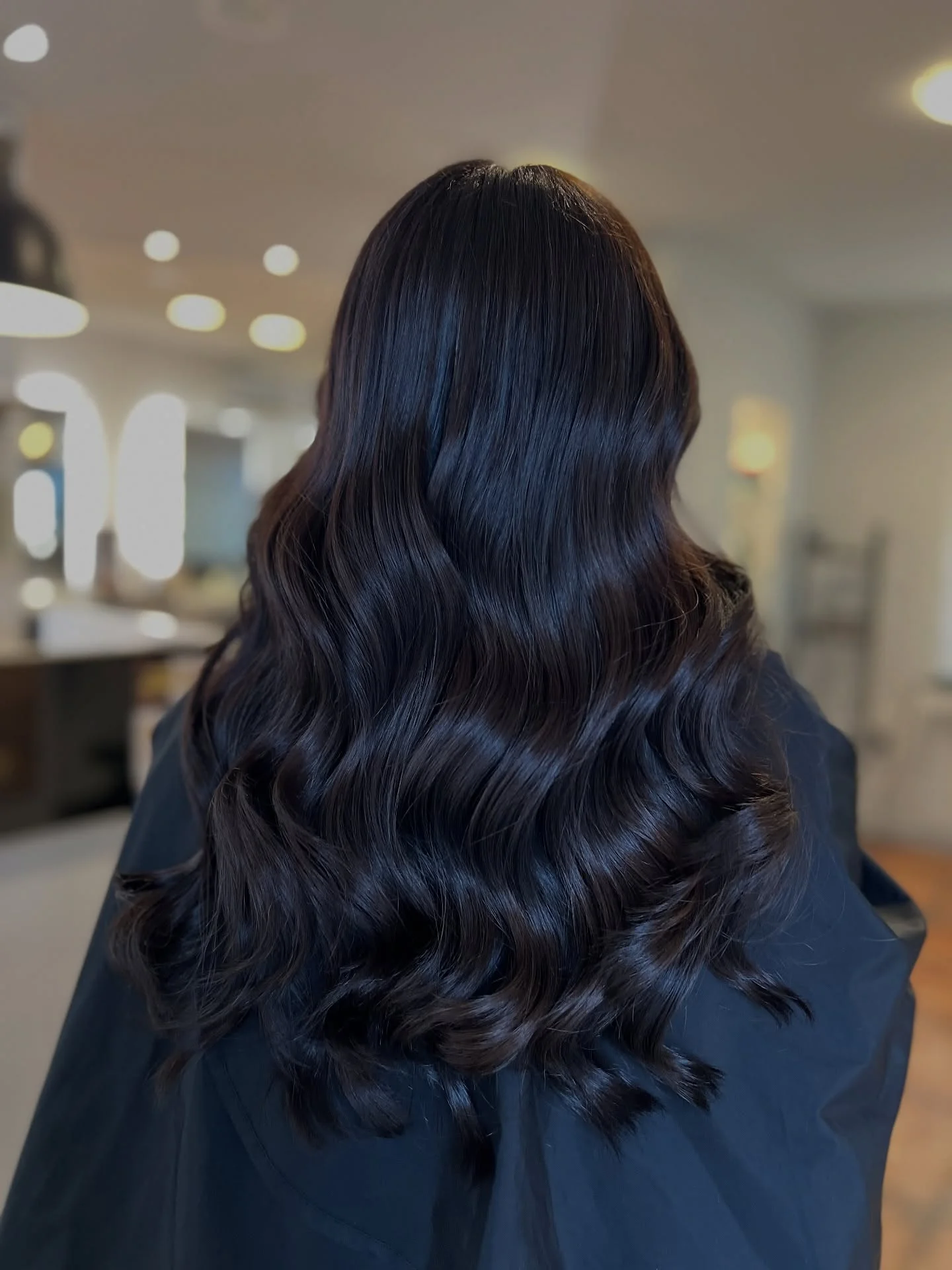 modern summer espresso brunette hair color 2026 Midnight Espresso Waves With Reflective Shine