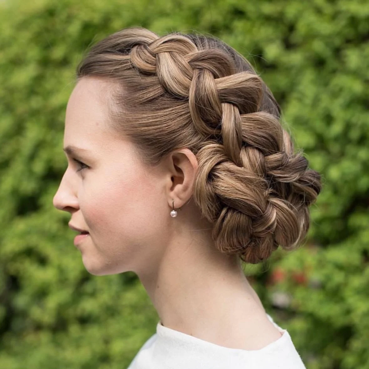 natural summer braids hairstyle 2026 Romantic Braided Updo With European Summer Vibes
