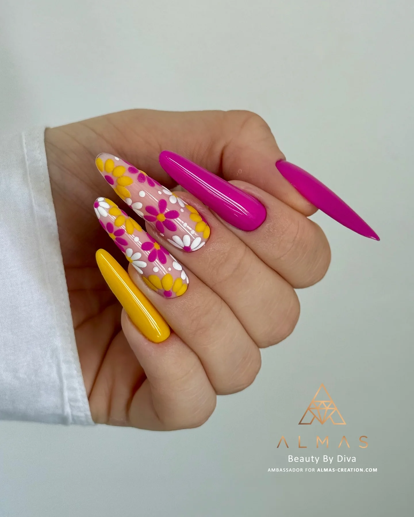 neon summer nails 2026 Groovy Floral Stiletto Nails With Retro Neon Charm