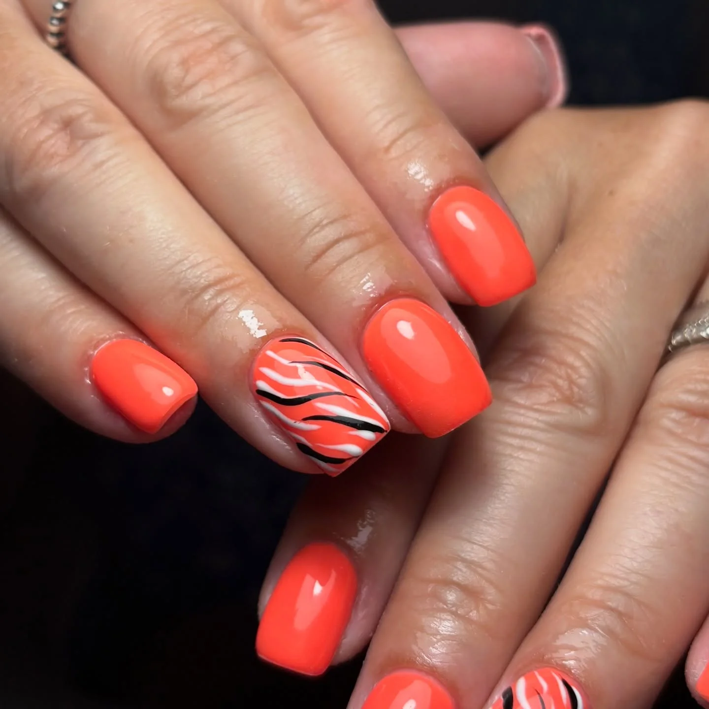 short squoval nails design 2026 Neon Coral Waves With Modern Graphic Details