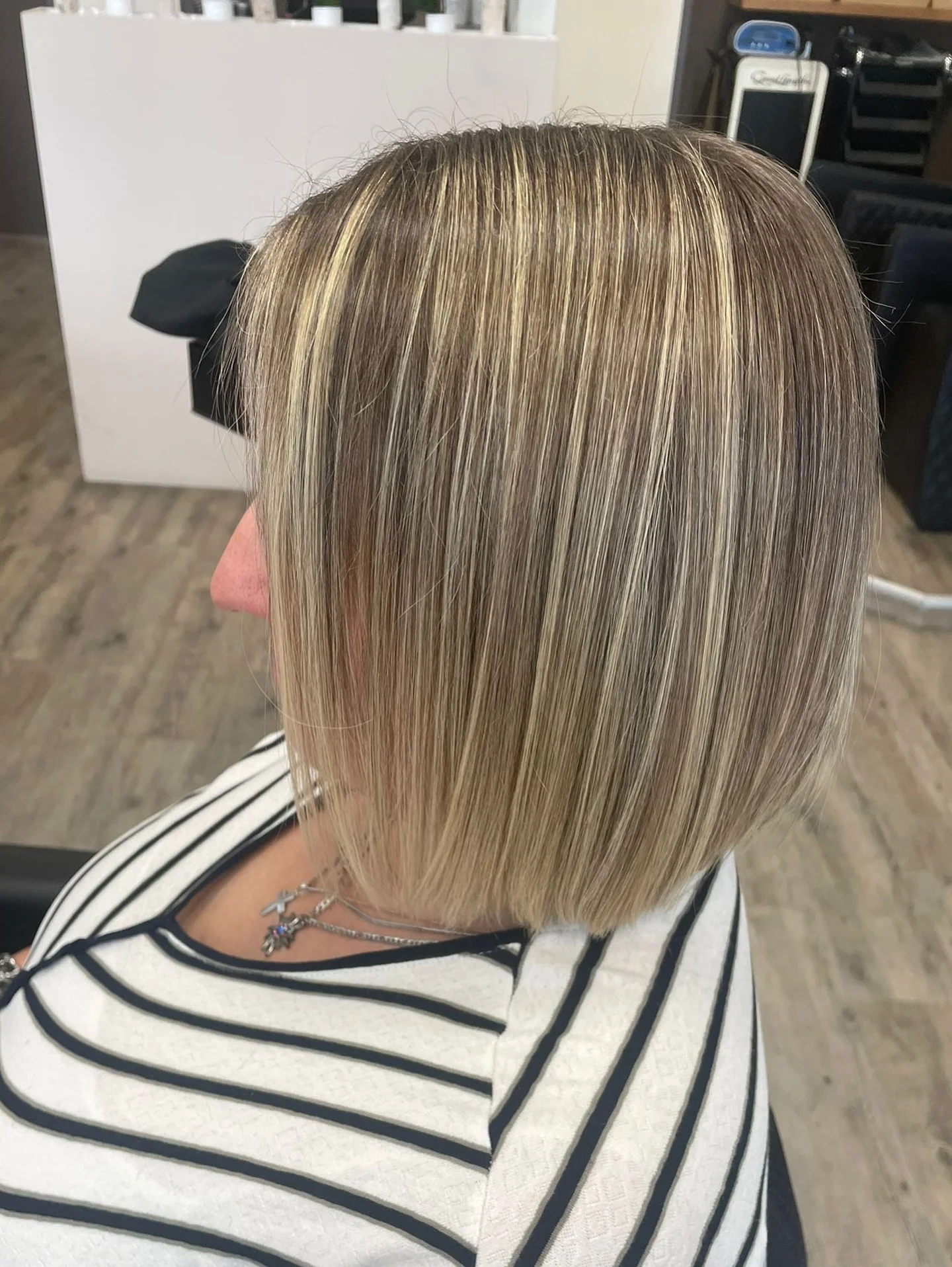 stylish summer haircuts for women over 60 2026 Blunt Precision Bob With Dimensional Highlights