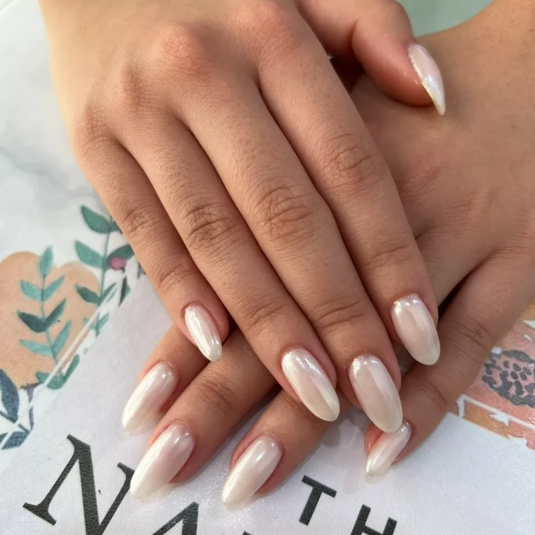 summer nail colors 2026 Pearl Chrome Almond Nails With Quiet Luxury Energy