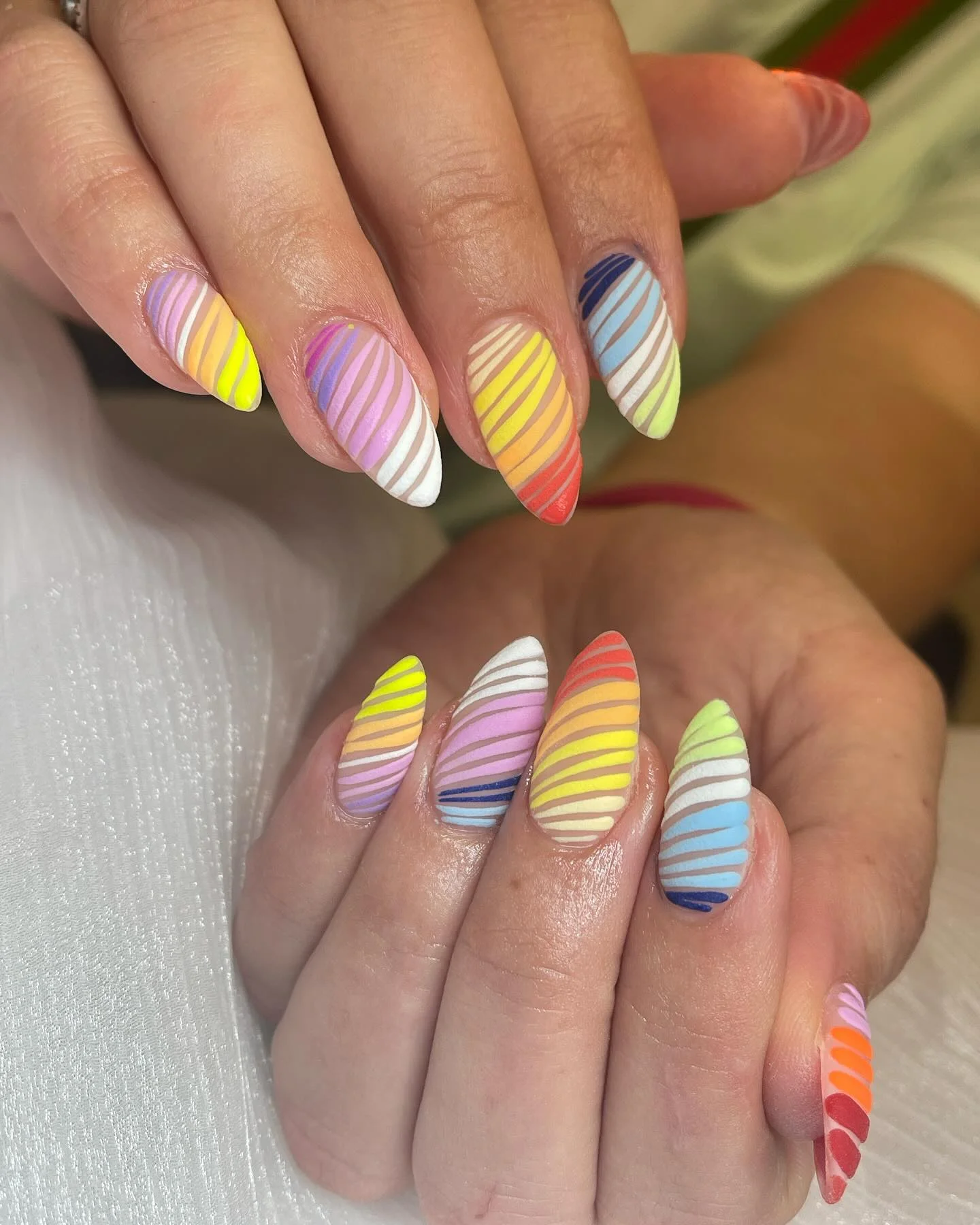 summer vibrant nails 2026 Rainbow Swirl Stripe Almond Nails