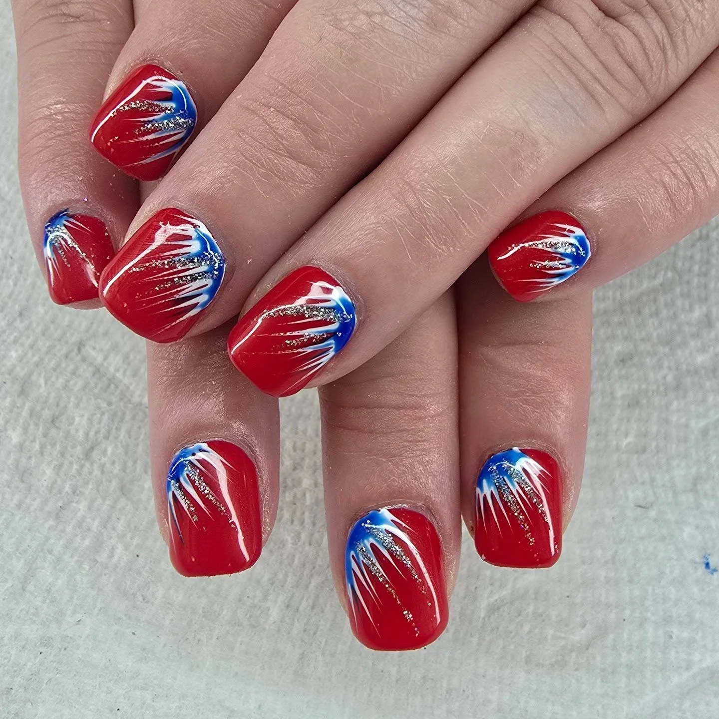 usa nails 2026 Bold Red Nails With Electric Firework Streak Nail Art
