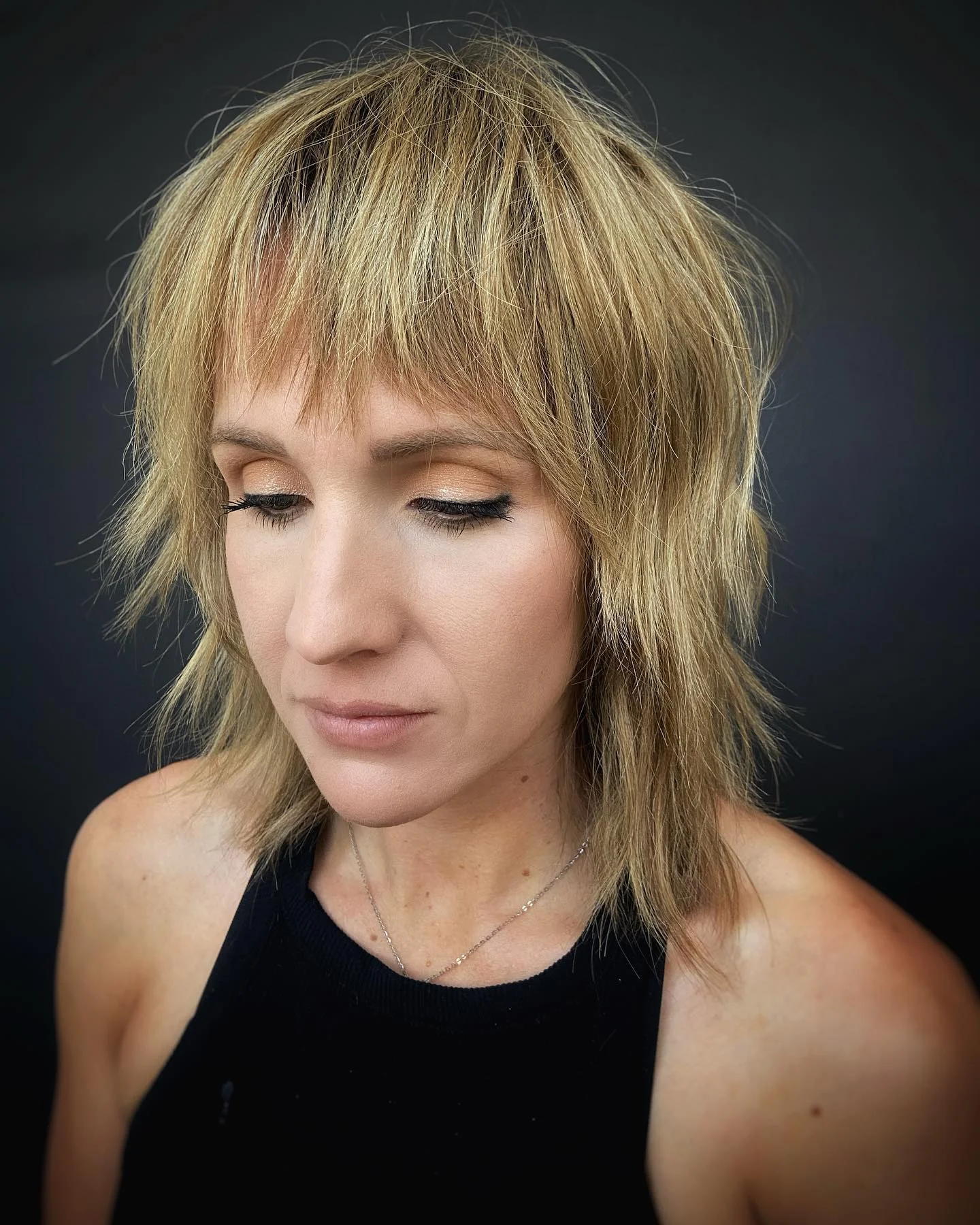 edgy summer shag hairstyle 2026 Feathered Blonde Shag With Soft Razor Layers