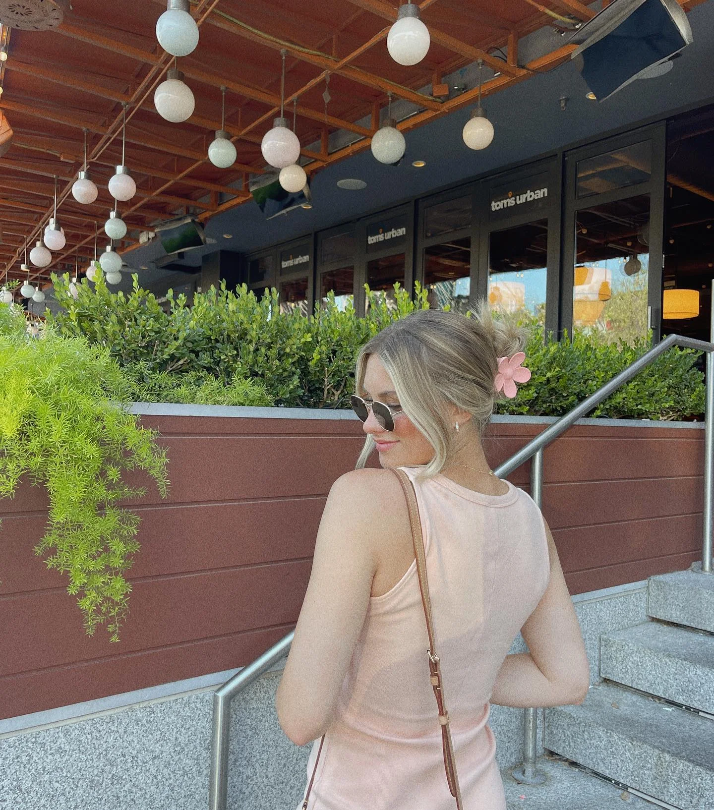 flattering summer quick hairstyles 2026 Flower Clip Updos Bring Back Soft Feminine Summer Styling