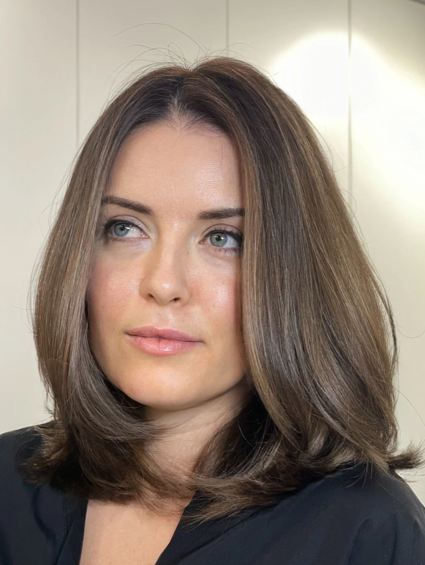 sophisticated summer haircuts for women over 40 2026 Soft Layered Shoulder Length Cut With Volume Ends