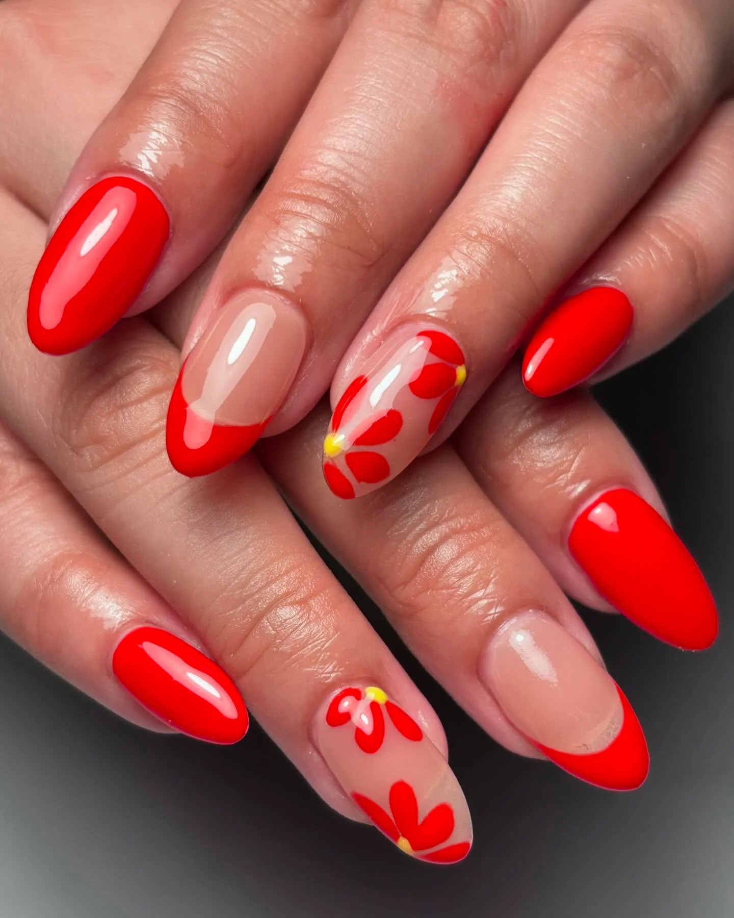 summer flower nails 2026 Bright Red Floral French Tips With A Modern Twist
