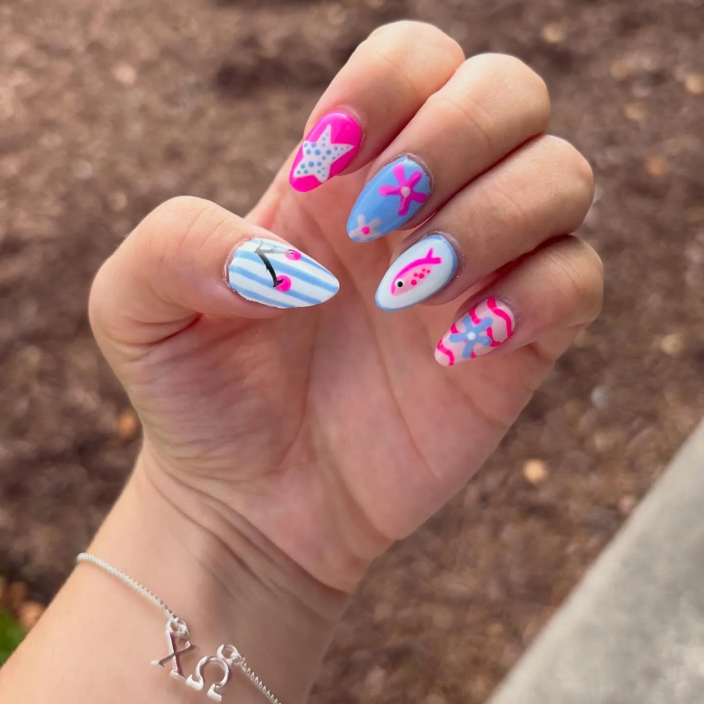 summer nails design 2026 Playful Starfish And Cherry Pop Nails