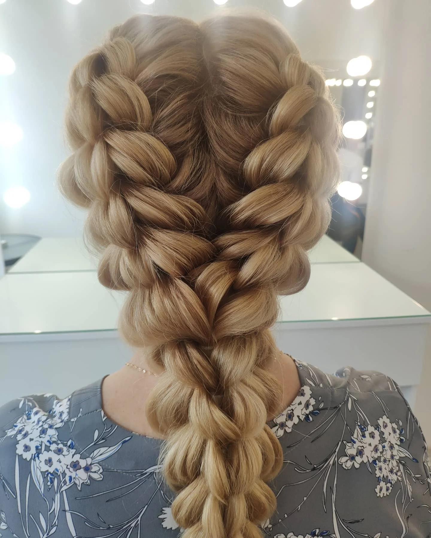 natural summer braids hairstyle 2026 Voluminous Blonde Crown Braid With Romantic Texture
