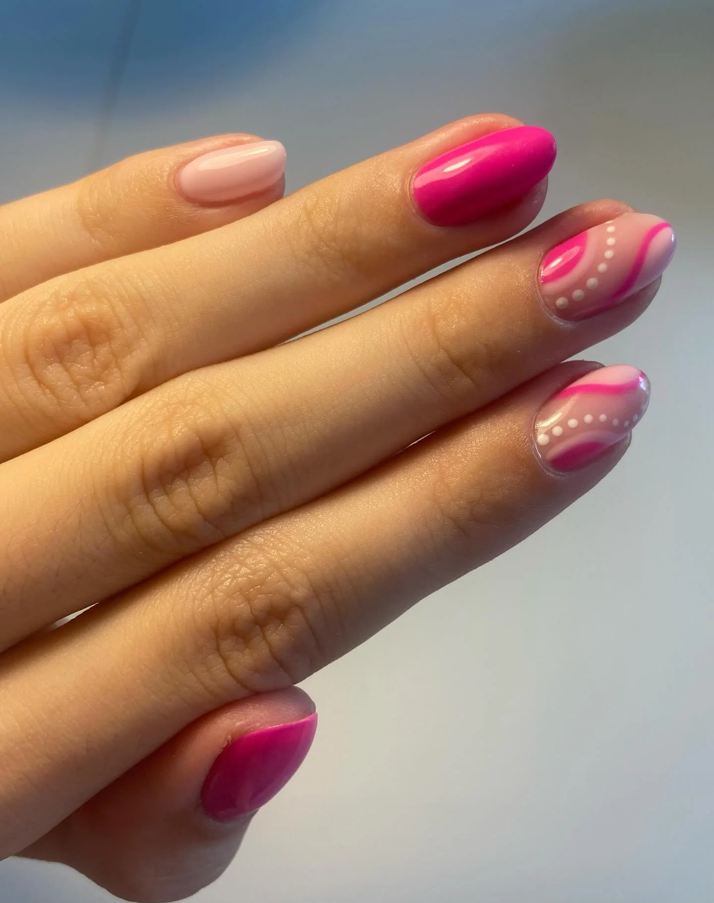 pink summer nails 2026 Minimal Swirl Nails In Hot Pink Gloss