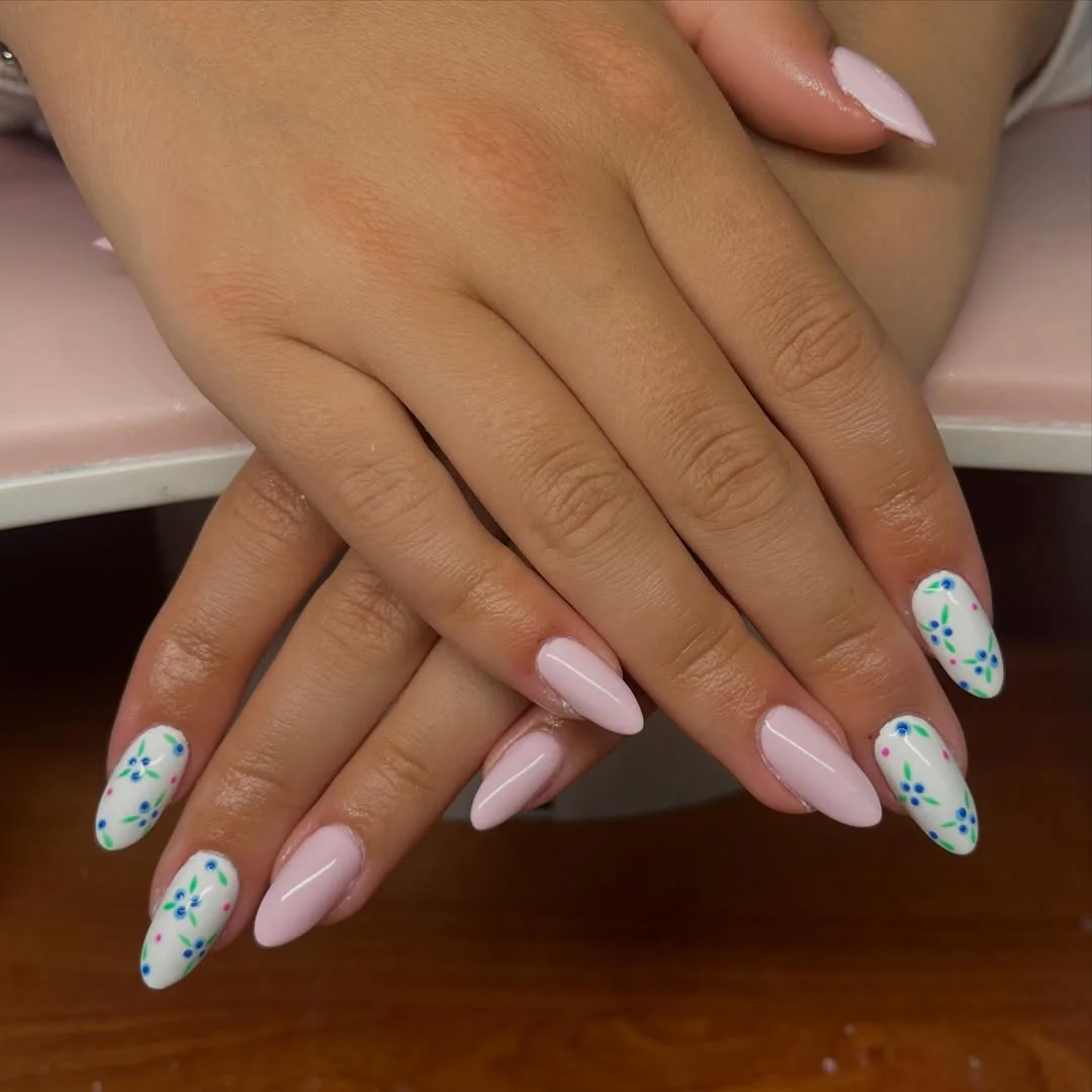 summer nail inspo 2026 Soft Pink Almond Nails With Tiny Wildflower Accents
