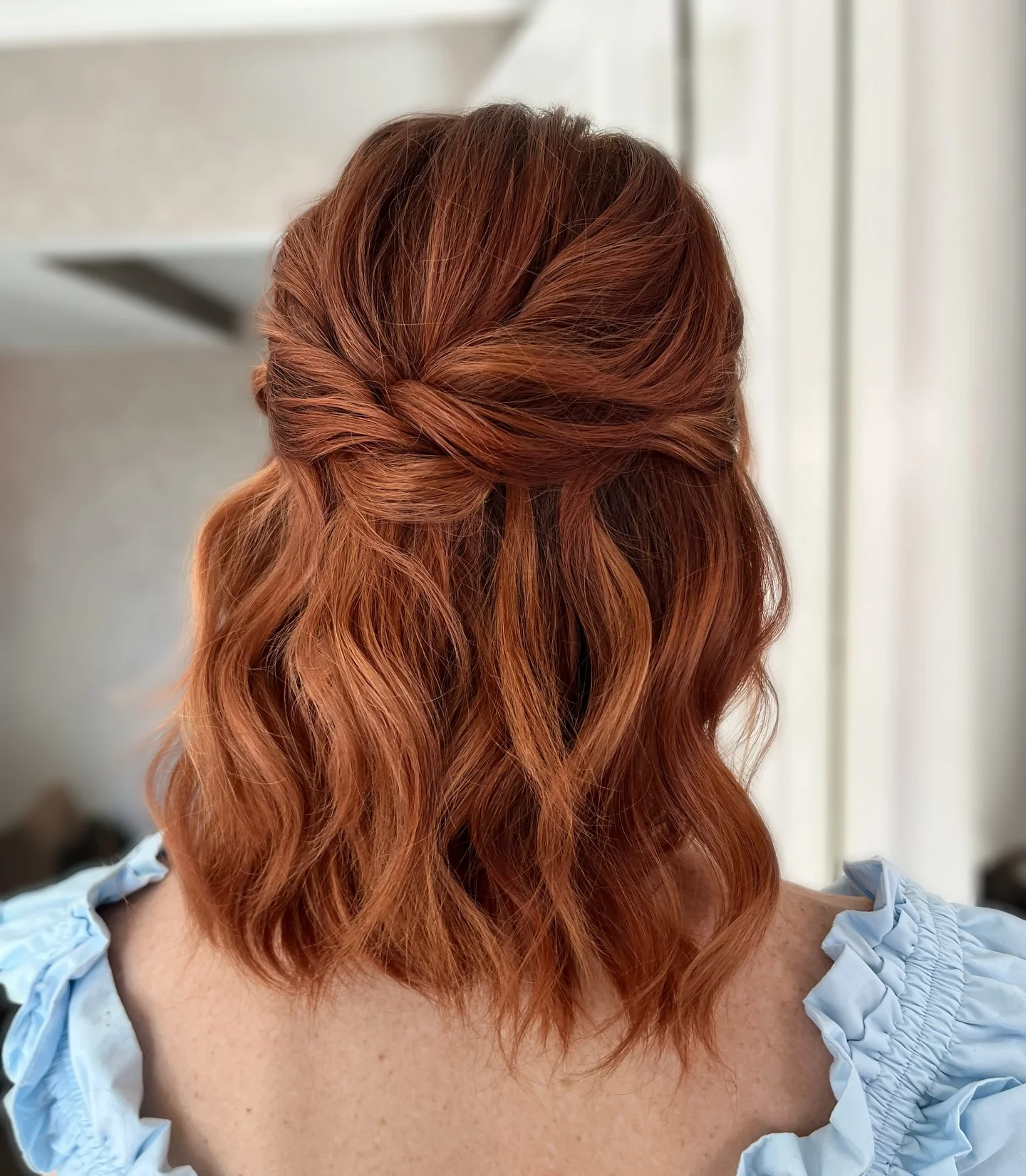 best summer short hairstyles 2026 Glossy Copper Waves With Romantic Volume