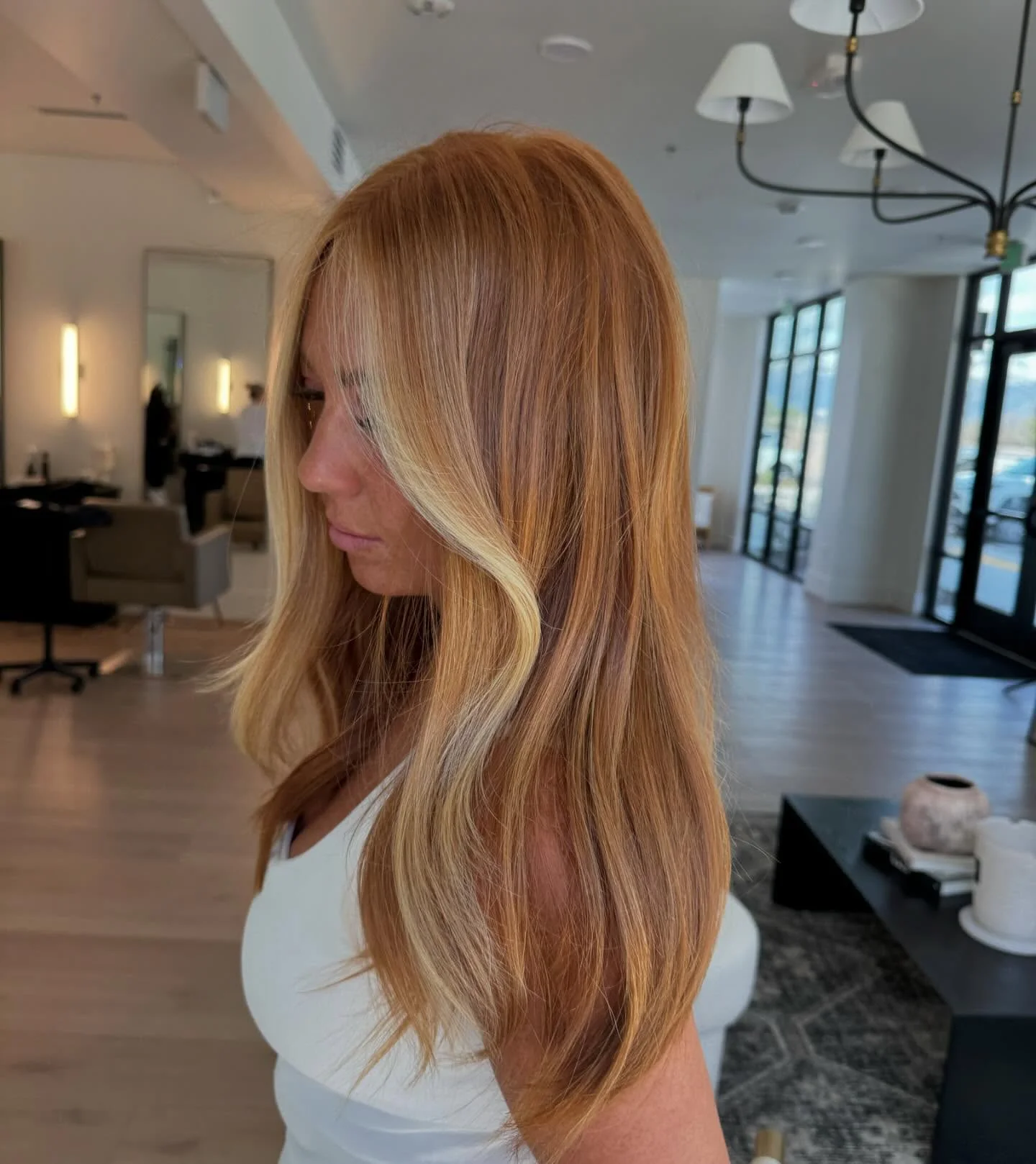 lived-in summer strawberry blonde hair color 2026 Honey Strawberry Blonde With Dimensional Ribbon Highlights