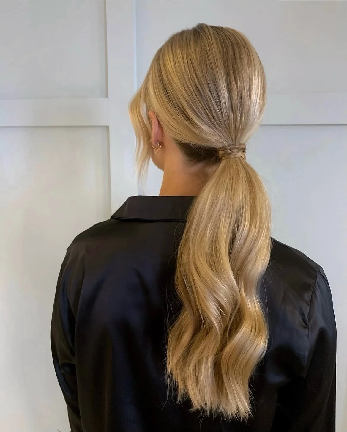 polished summer ponytail hairstyle 2026 Low Blonde Ponytail With Quiet Luxury Energy