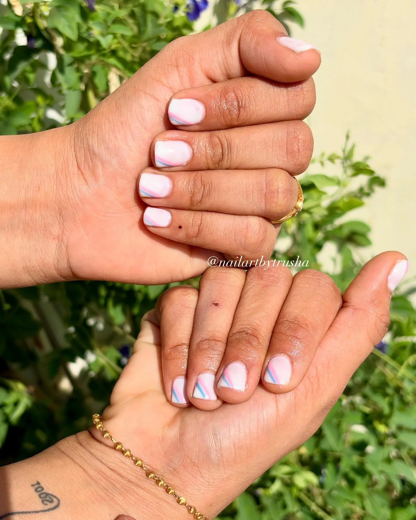 short summer nails 2026 Soft Pastel Swirl Nails With Barely-There Details