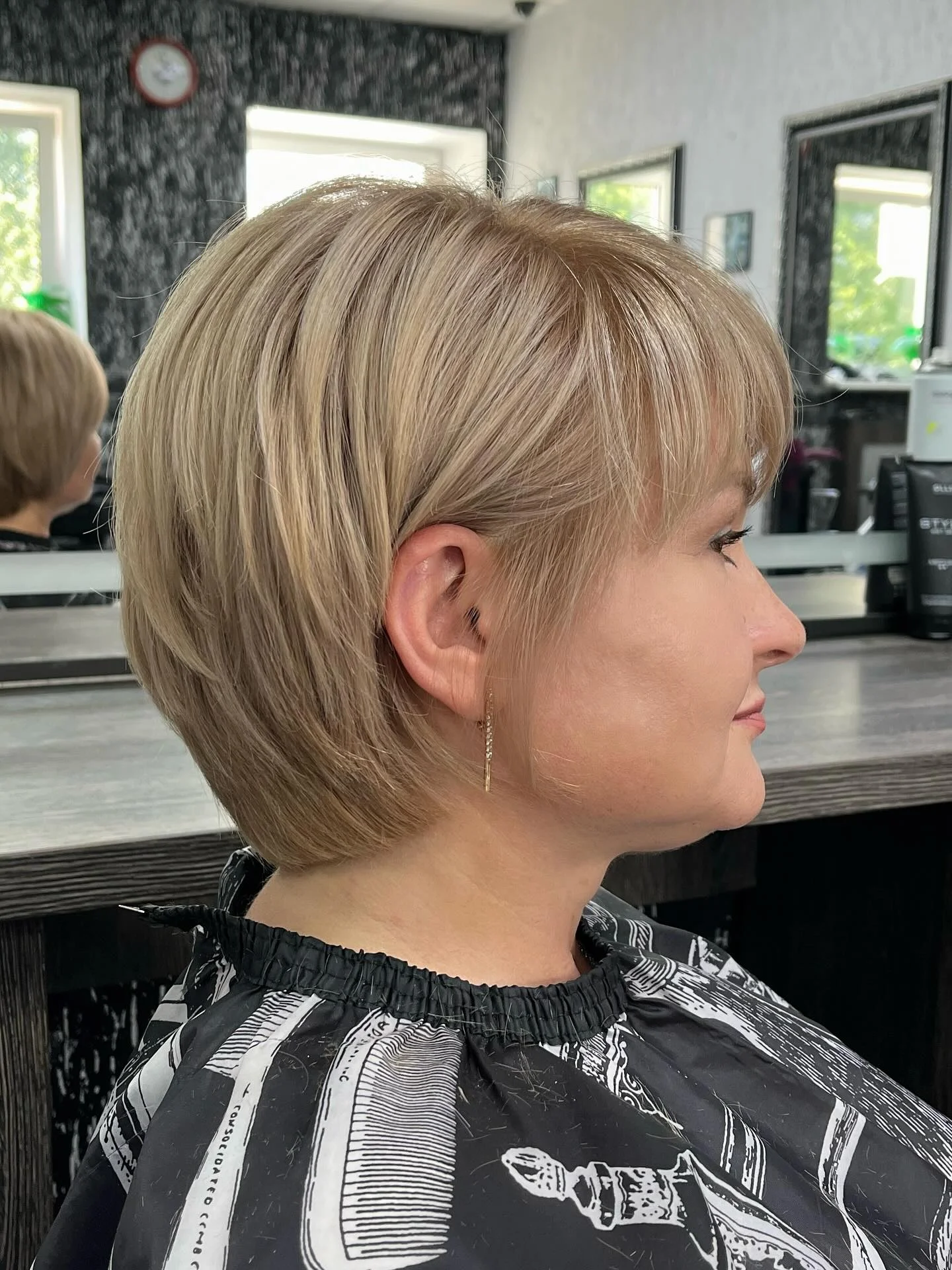 summer haircuts women over 50 Soft Graduated Pixie Bob With Side Sweep