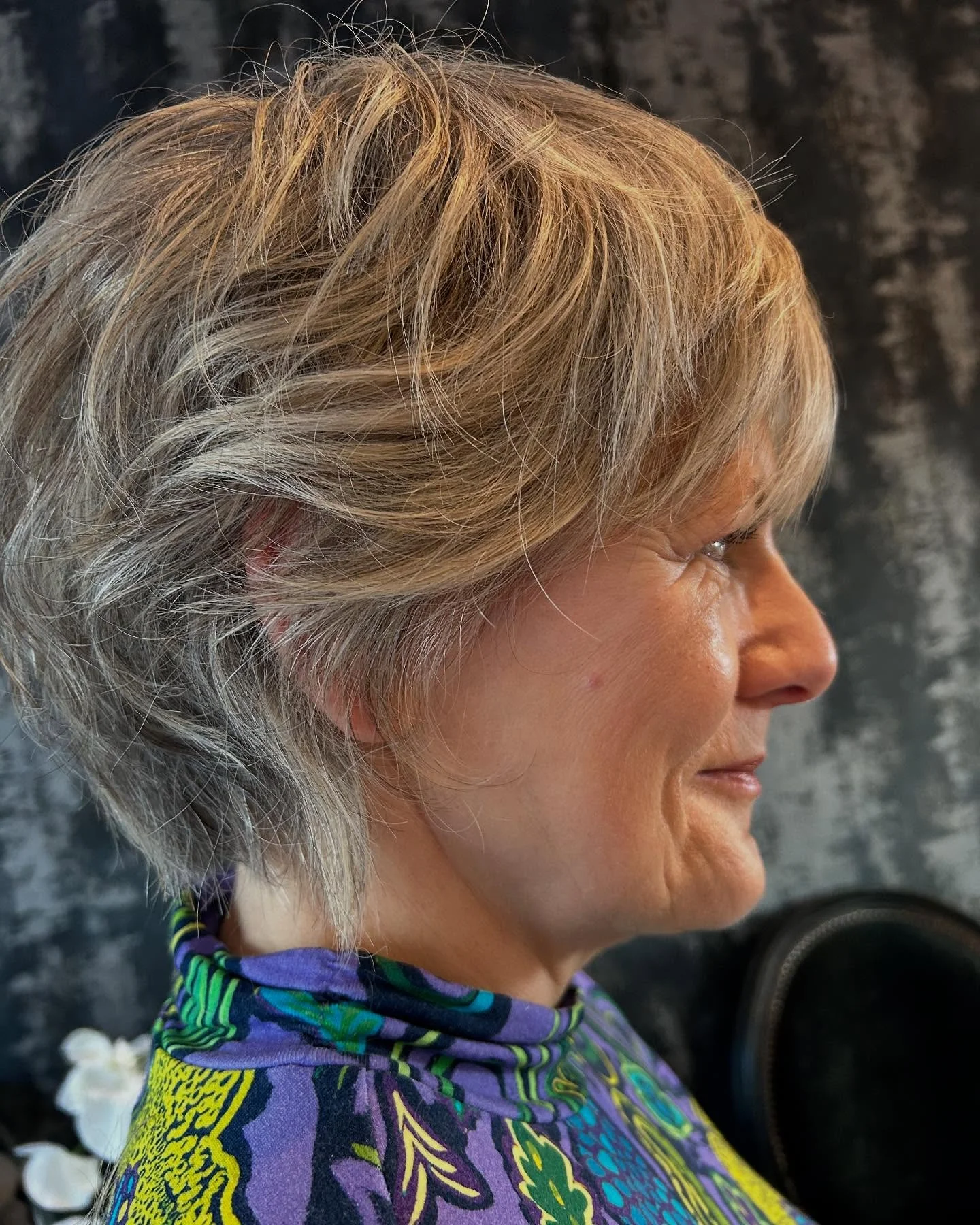 stylish summer haircuts for women over 60 2026 Short Feathered Pixie With Light Layers